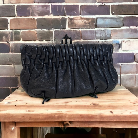 Michael Kors Handbags - Michael Kors Leather Clutch W/Jewel Zipper Pull